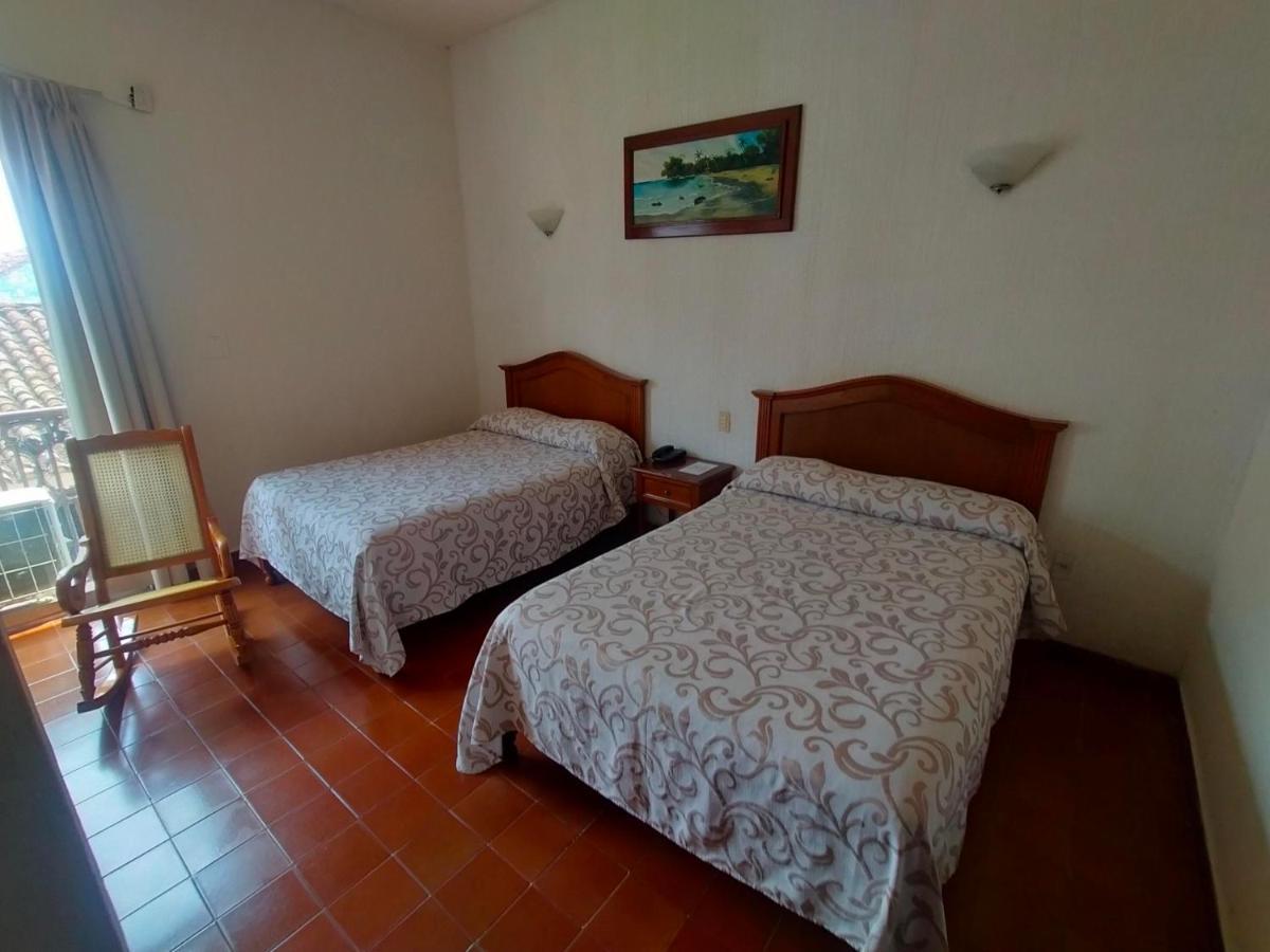 Hotel Posada Dona Lala ตลาโคตาลปัน ภายนอก รูปภาพ