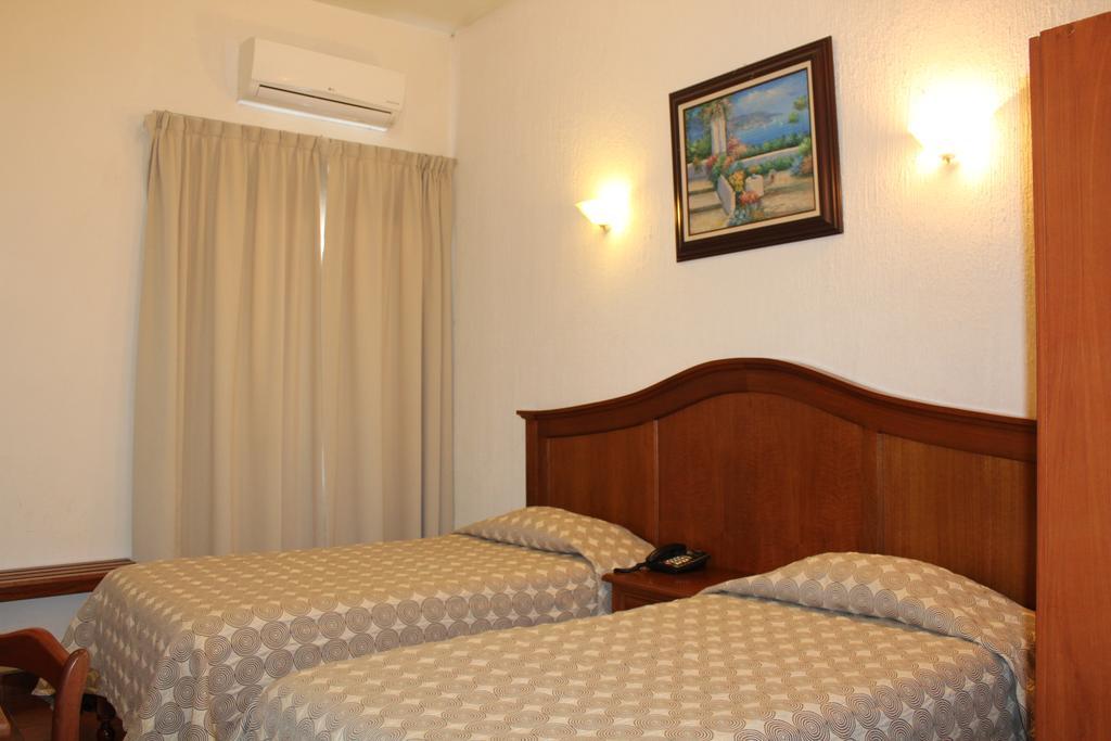Hotel Posada Dona Lala ตลาโคตาลปัน ภายนอก รูปภาพ
